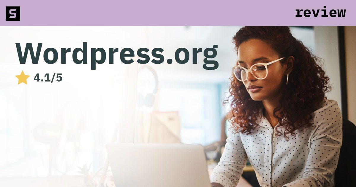 Person sitting at desk using wordpress.org.