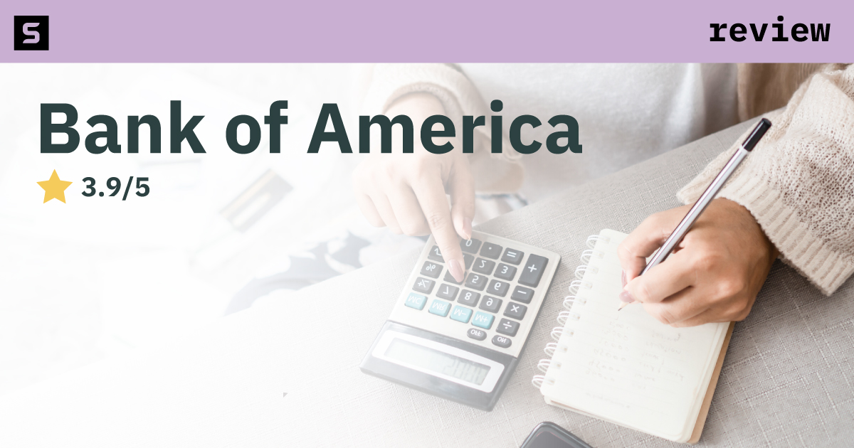 Businessman pointing at Bank of America logo.