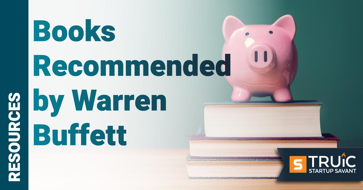 Piggy bank on stack of books.