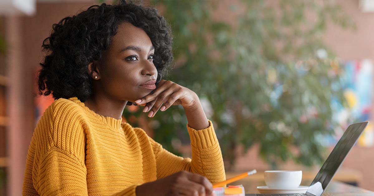 Woman reading the biggest mistakes and lessons of entrepreneurs