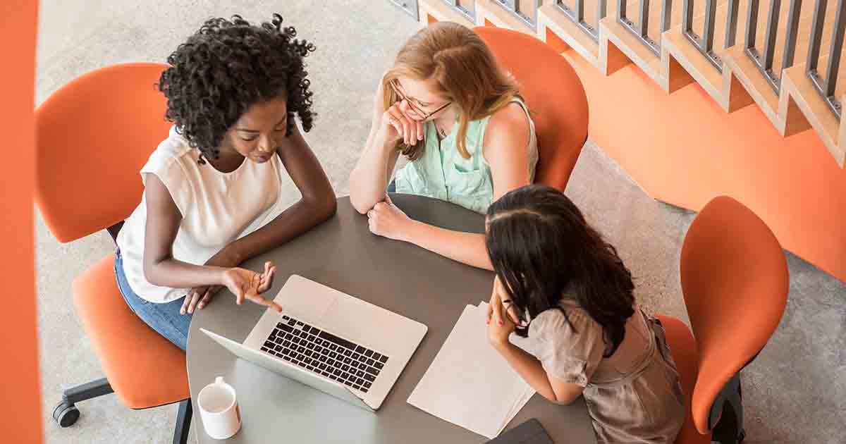 Women looking at a computer and learning.