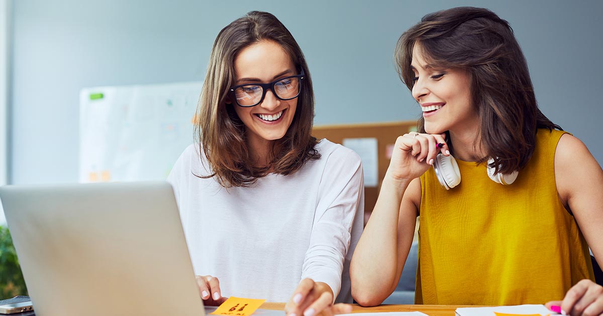 Businesswomen working together.