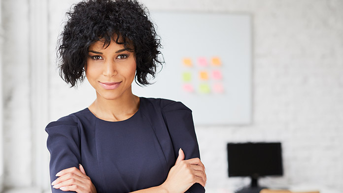 Smiling businesswoman in an office.