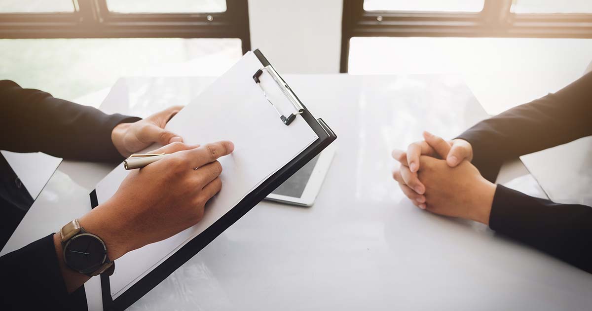 Two businesswomen in a meeting discussing business.